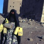 A woman carrying water. 